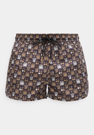 Férfi fürdőnadrág fekete alapon barna és fehér trópusi levelek és virágmintával, rugalmas derékrésszel és fekete húzózsinórral.