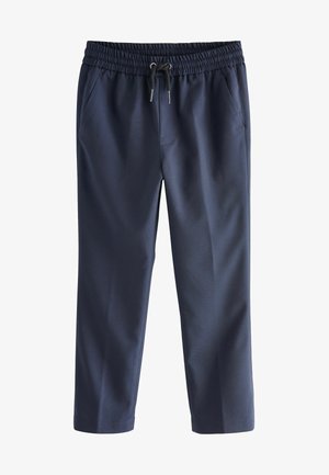 Pantalones activos azul marino de material elástico, con cintura elástica y cordón, bolsillos laterales y un diseño ajustado.