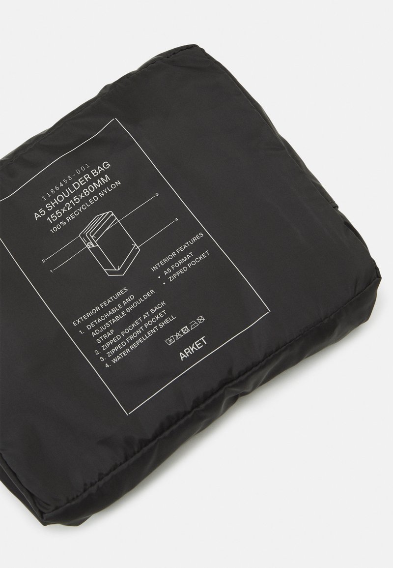 ARKET COMMUTER CROSS BODY UNISEX Camera bag black Zalando.ie