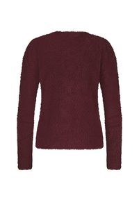 Langarm, fluwelen bordeauxrode trui met een ronde hals en een zachte, gestructureerde stofafwerking.
