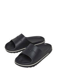 Infradito neri con open toe, superiore in sintetico liscio, soletta rigata, suola bianca a contrasto e logo impresso sulla fascia.