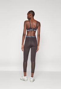 Nike Performance 365 - Leggings - velvet brown