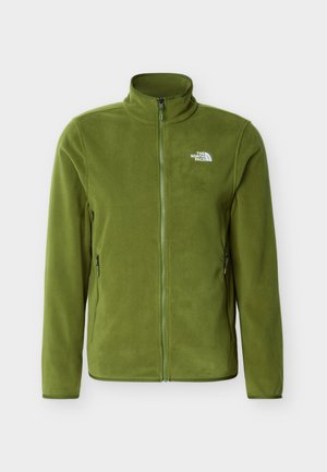 Jachetă verde din fleece cu fermoar complet frontal, guler înalt, buzunare laterale cu fermoar și logo-ul alb The North Face pe pieptul stâng.
