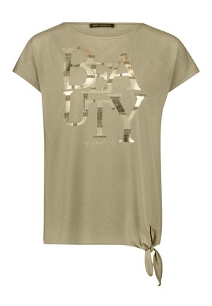 Haut beige à manches courtes avec le texte métallique « BEAUTY », col rond et détail de nœud sur le côté à l'ourlet.