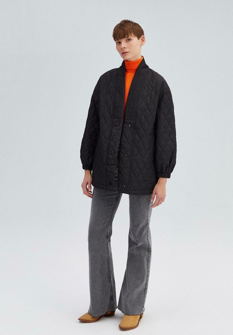 Touché Privé Wintermantel zwart