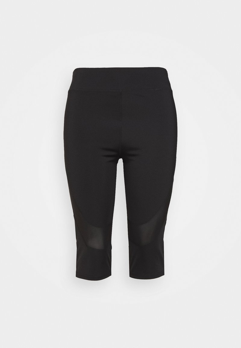 Collants de sport noirs longueur genou avec taille haute et panneaux en mesh au-dessus des genoux, présentés à plat sur un fond blanc.