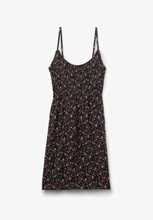 Czarna sukienka w kwiaty z cienkimi ramiączkami, gorsetem z marszczeniami i zwiewnym dołem. Charakteryzuje się małymi czerwonymi i białymi kwiatami na czarnym tle.