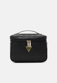 Black cosmetic bag with embossed floral pattern, gold hardware, a triangular logo, and a top handle; rectangular shape with a zip closure.