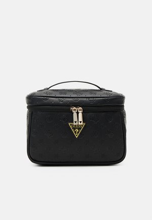 Black cosmetic bag with embossed floral pattern, gold hardware, a triangular logo, and a top handle; rectangular shape with a zip closure.