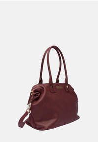 Bordeaux lederen handtas met twee stevige handvatten, een ritsluiting en een gladde textuur. Voorzien van verfraaiingen in goudtint.