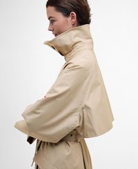 Beige cropped jacket with high collar, wide sleeves, and a cinched waist. Smooth texture with minimal hardware and clean lines.