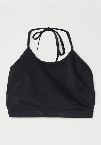 Top court noir en tissu extensible. Doté d'un design à dos noué, col plongeant et d'un logo discret le long de l'ourlet.