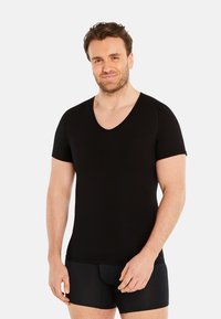 FINN Design - STARKE KOMRPESSION SHIRT KURZARM - Shapewear - schwarz Thumbnail Image 1