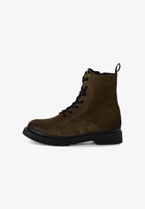 Brown suede ankle boot with a round toe, black laces, and textured rubber sole. Features a pull tab at the back for easy wear.