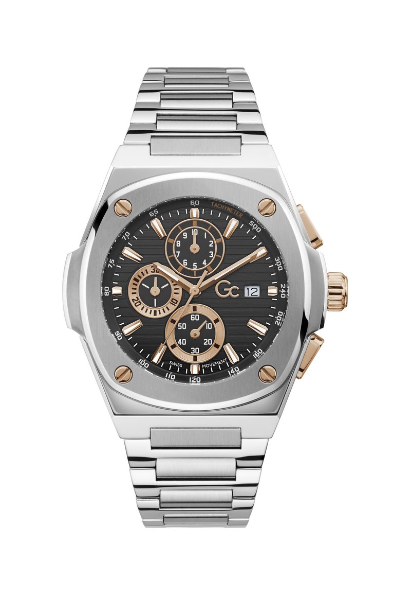 Ročna ura iz nerjavečega jekla s črnim številčnim prikazovalnikom, zlatimi poudarki, tremi podštevilčnicami, prikazom datuma na poziciji 3 ure in pasom iz povezanih kovinskih členov.