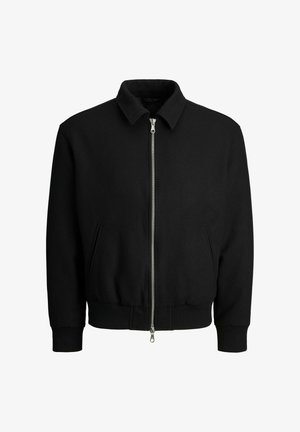 Jachetă bomber neagră dintr-un amestec de lână, cu fermoar frontal, două buzunare laterale și manșete și tiv din tricot. Design clasic al gulerului.