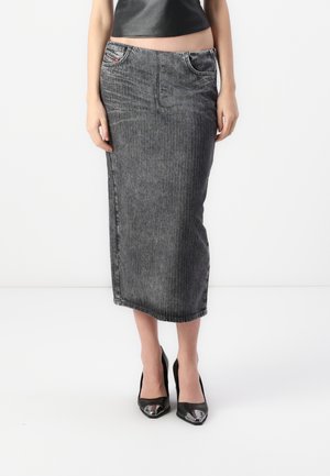 Gray denim midi skirt with vertical stripes, front pockets, and a fitted design, paired with black high-heeled shoes.
