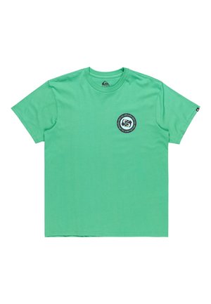 T-shirt verde in cotone con scollo rotondo e maniche corte. Presenta un logo circolare sul lato sinistro del petto. Orlo piatto, texture liscia.