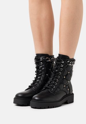 ORMOND - Stivaletti con plateau - black