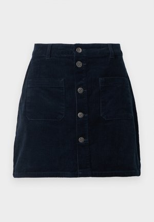 Marineblå fløjlskørt med en knap-frontend design, to for-lommer og lodret ribbet tekstur. Har fem knapper langs midten.