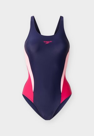 Tmavě modré jednodílné plavky Speedo s růžovými bočními panely a logem, s výstřihem do kulata a širokými ramenními popruhy.