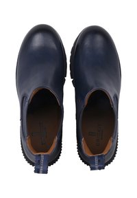 Marineblaue Leder-Stiefeletten mit elastischen Seiten, runder Zehenpartie, strukturiertem Gummi-Sohle und kontrastierendem braunen Innenfutter. Mit einer Zuglasche ausgestattet.