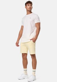 INDICODE JEANS Yates - Donji dijelovi trenirke - anise flower