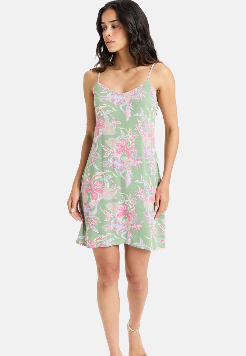 Light green floral dress with thin spaghetti straps, featuring pink and blue floral patterns, a flared hem, and soft, lightweight fabric.
