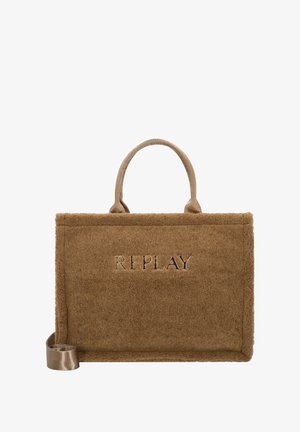 Brown fabric tote bag with short handles and an adjustable strap. Features a textured surface and embossed "REPLAY" logo on the front.
