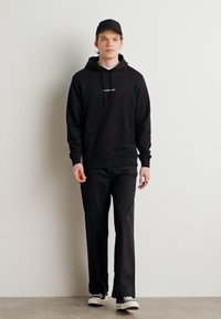 Calvin Klein Jeans GRID MONOGRAM HOODIE - Felpa - black