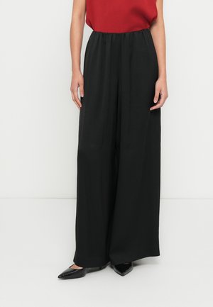 TWEEZER - Pantalones - black