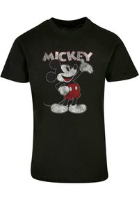 Camiseta de algodón negra con un gráfico de Mickey Mouse en rojo y blanco, con el texto "MICKEY" encima del personaje.