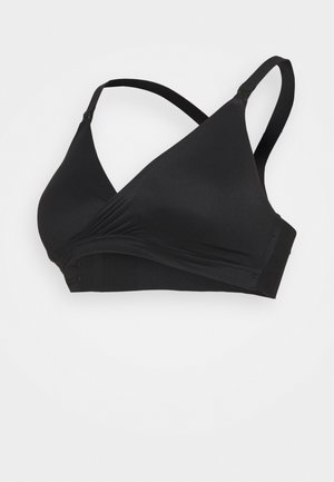 Black wrap-style bra featuring soft fabric, adjustable straps, and a wide elastic band at the bottom for support. Smooth texture with no padding.