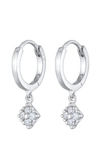 Ohrringe aus Sterlingsilber in Form von Creolen mit einem floralen Anhänger-Design, veredelt mit klaren Zirkonia-Steinen für Glanz und Detail.