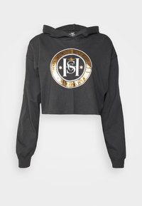 Kort svart huvtröja i bomull med en glänsande gul cirkulär logotyp som har texten "HSH" och "CALIFORNIA" i fet stil. Långa ärmar.