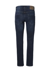 Jeans in denim blu scuro mostrati da dietro con due tasche posteriori e una toppa in pelle marrone in vita.