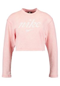 Rosa kortärmad sweatshirt tillverkad av mjukt tyg, med långa ärmar och en framträdande vit Nike-logotyp på framsidan.