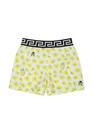 Costumi da bagno da uomo bianchi con un motivo floreale giallo, vita nera con un design geometrico e dettagli di coccinelle e fragole.
