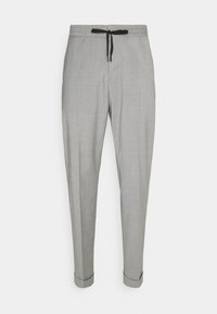 Lichtgrijze broeken met een gestructureerde afwerking, een elastische tailleband en een zwarte trekkoord, met taps toelopende benen en afgeronde zoom.