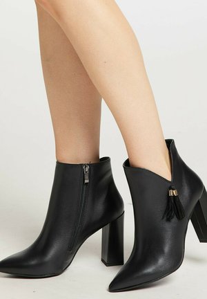 Bottines à talons hauts - schwarz