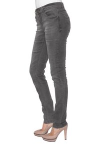 Grijze denim jeans met een slim fit, voorzien van een taille met middenhoogte, achterzakken en ton-sur-ton stiksels. Draag ze met nude hoge hakken.