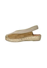 Bruine suède espadrille met een beige elastische band en een geweven jute zool. Beschikt over een ronde neus en gestikte accenten langs de zool.