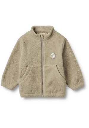 Fleece jacket in light beige, featuring a high collar, front zipper, two side pockets, and a round logo patch on the chest.