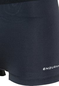Sorte stretch-material boksershorts med en glat tekstur, der har et logoaccent på den nederste front og et tætsiddende, sømløst design.