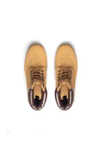 Brązowe skórzane buty z padded kołnierzem, okrągłym czubkiem i sześcioma otworami na sznurowadła, z widocznymi przeszyciami i solidną podeszwą.