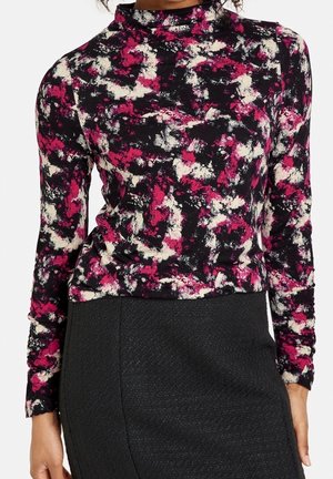 Langärmliges Top mit Stehkragen in schwarzem Grundton und abstrakten Mustern in Rosa, Weiß und Rot; weicher Stoff mit glatter Textur.