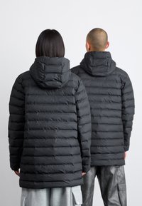Rains LOHJA LONG PUFFER JACKET UNISEX - Manteau d'hiver - black