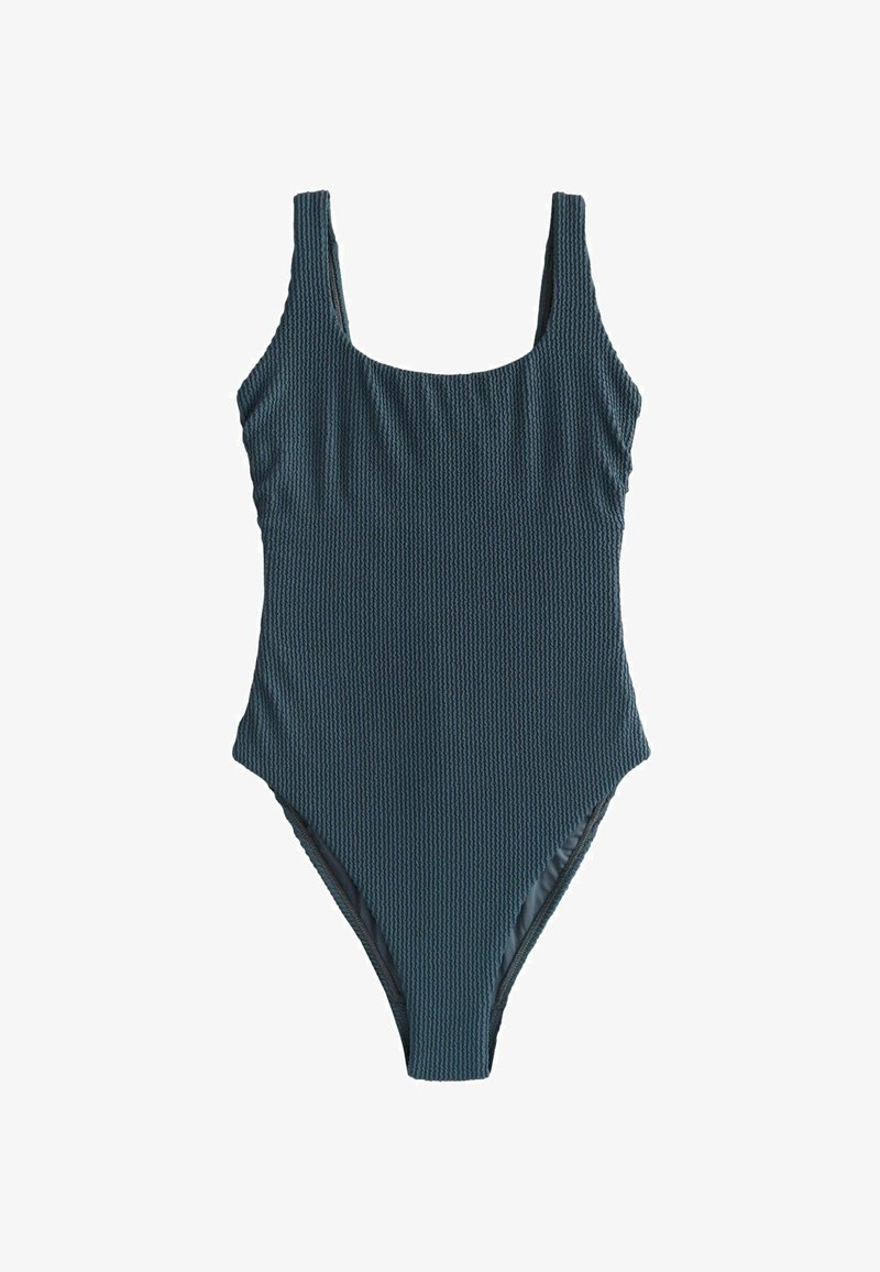 Maillot de bain une pièce texturé bleu sarcelle foncé avec larges bretelles et encolure arrondie, présenté sur un fond blanc.