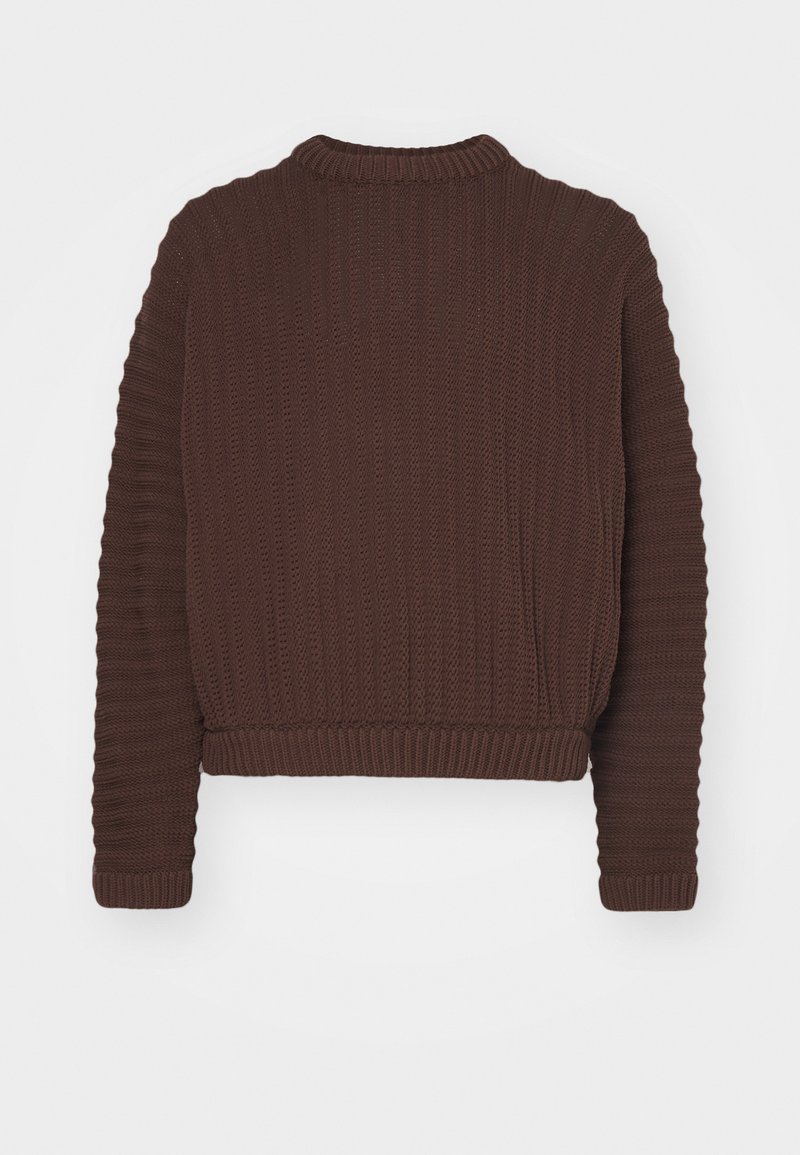 Brown knitted sweater with a ribbed texture, round neckline, and cropped length. Long sleeves feature ribbed cuffs.