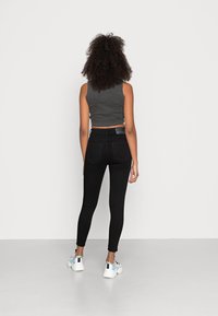 Diesel Vaqueros pitillo - black denim